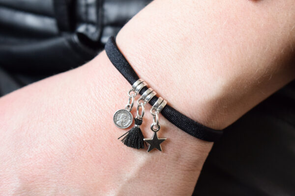 Armband met 3 zilveren bedels